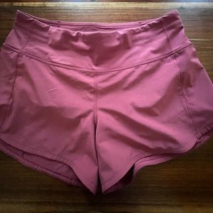 Lululemon size 6 speed up shorts. 4in length. Mint condition. Mauve color.